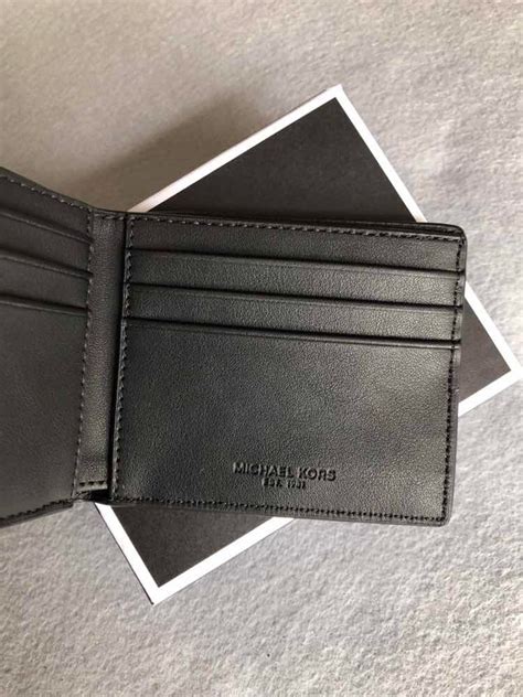 precio de cartera michael kors de caballero